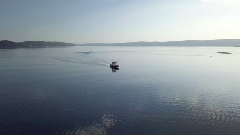 drone shot of a coastguard boat at nordstrand bad in oslo, norway.mp4