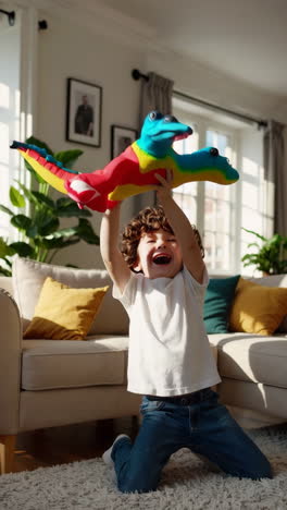 young boy playing with colorful dinosaur toy in living room