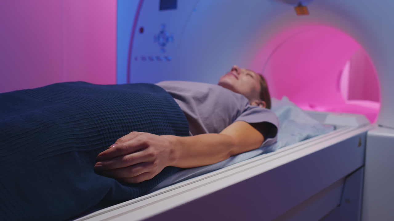 Young Woman Having MRI Scanning Procedure