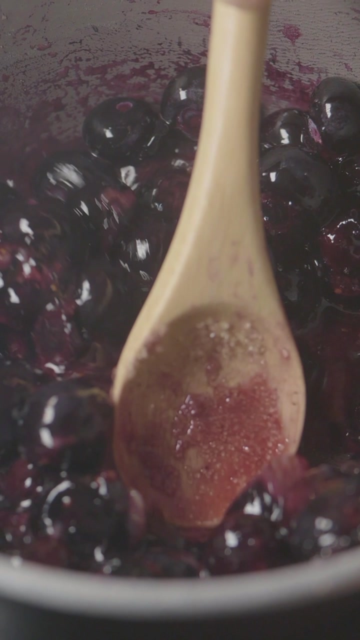 Cooking Blueberries and Sugar for Jam in a Pot