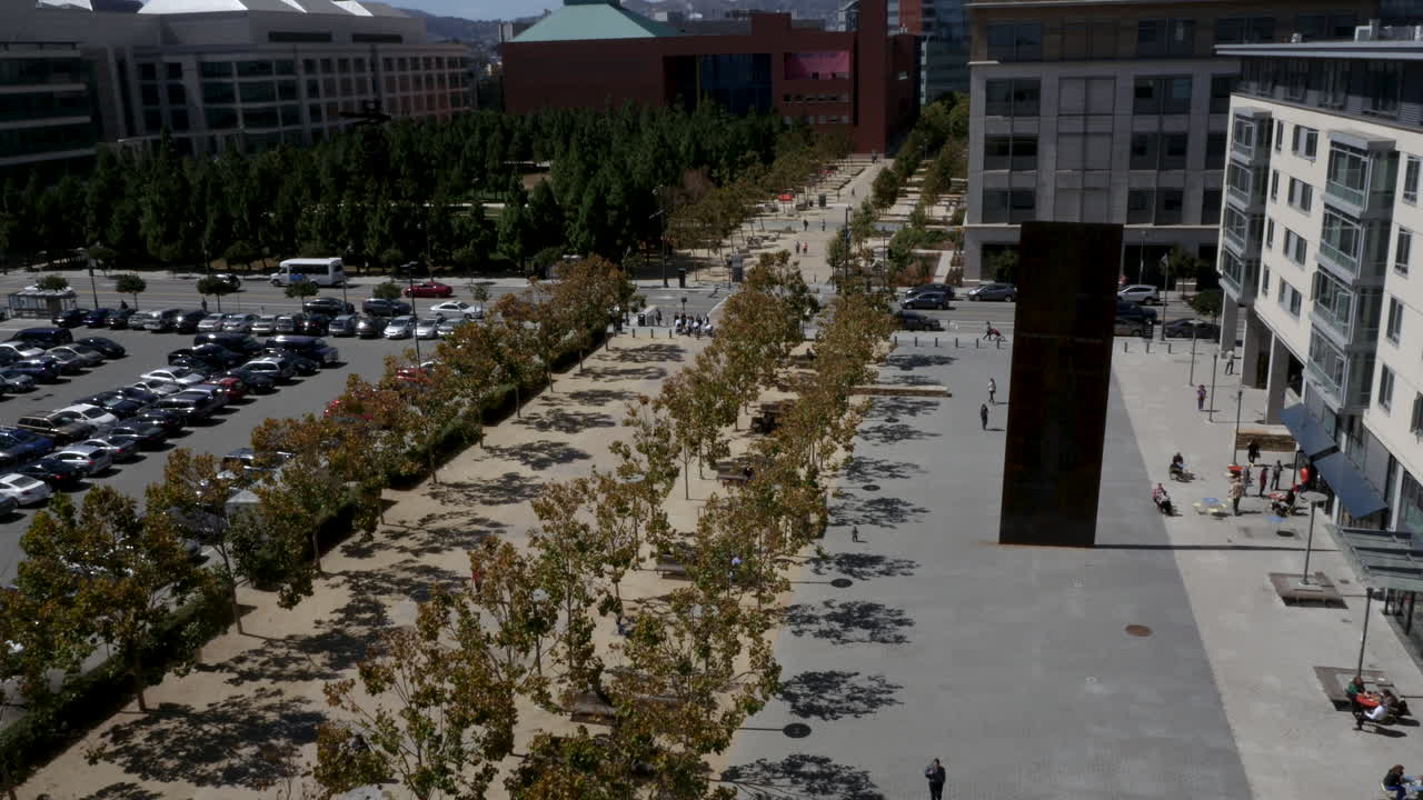 Aerial View of a Modern Urban Plaza with Trees and Buildings