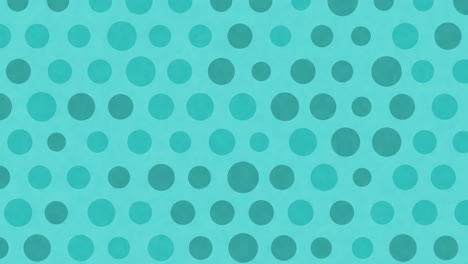 grüne polka-punkte bewegen sich auf dem hintergrund.
