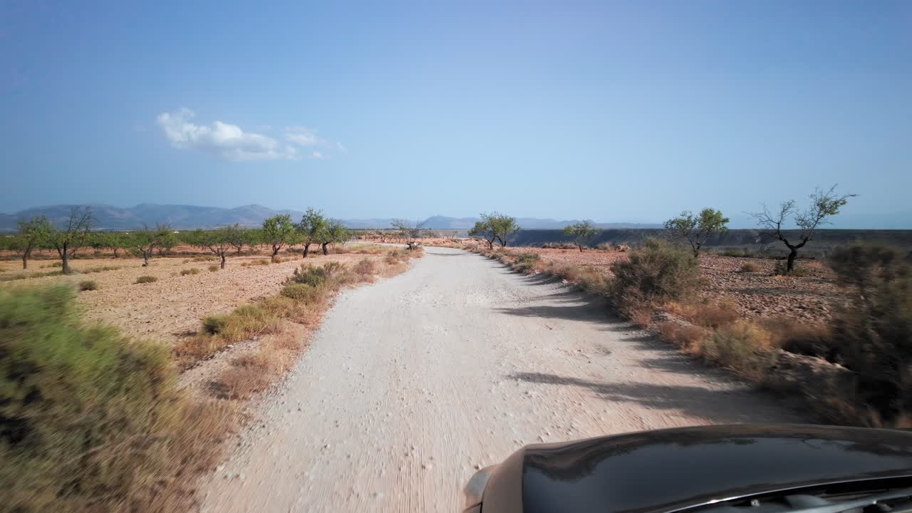 Driving trough a dirt road