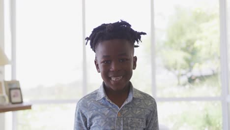 Young-boy-smiling-at-home