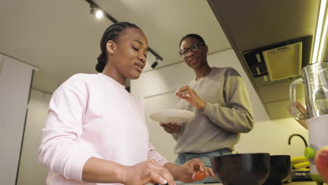 women preparing a salad