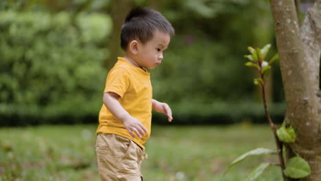 little asian kid outdoors