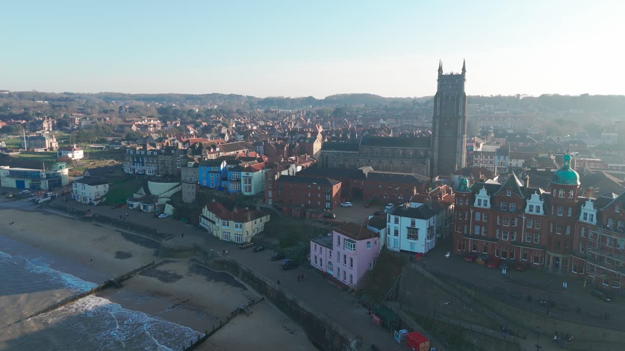 Coastal town of Cromer, Norfolk, with its beach, colorful houses, and historic church