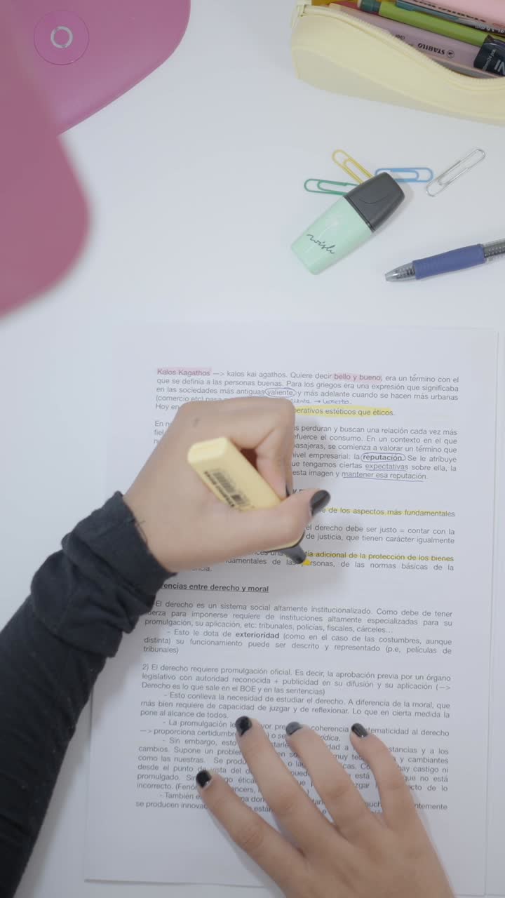 Person Highlighting Text on a Document