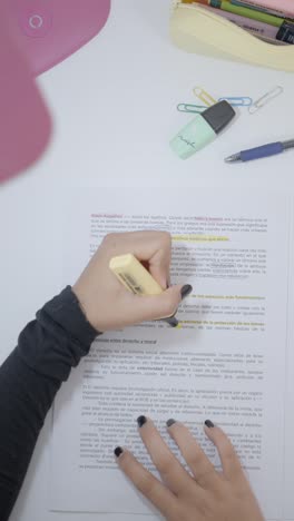 person highlighting text on a document