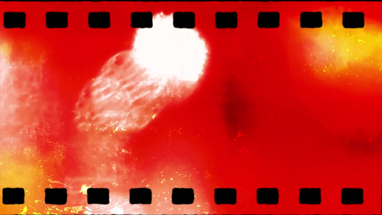 Overlay di bobina di pellicola vintage con fughe di luce rosse e graffi