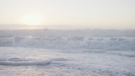 blue sky and sea with waves on empty sunny beach