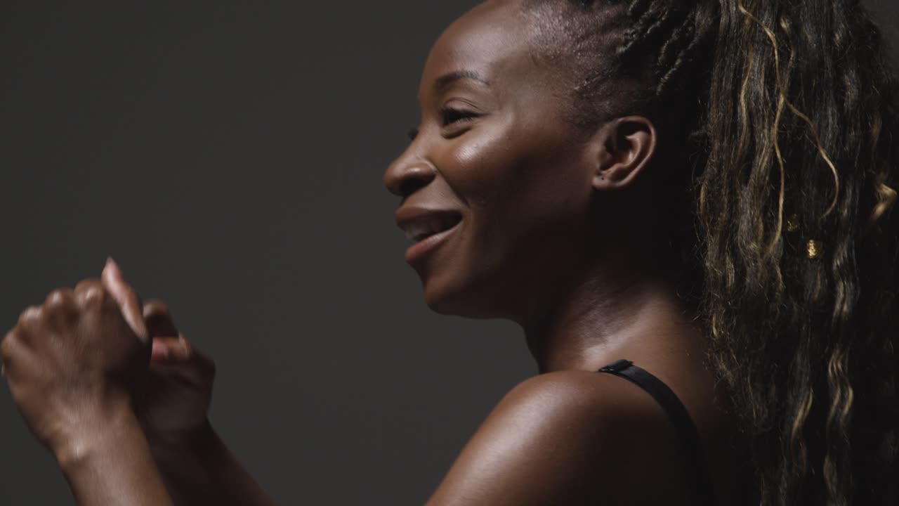 Studio Portrait Of Young Woman Wearing Fitness Clothing Training For Boxing In Gym 4