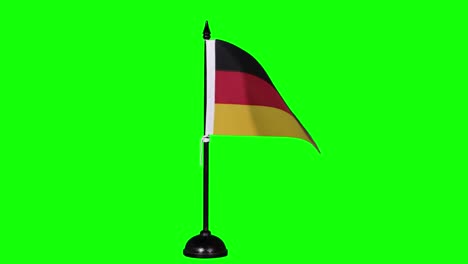 german miniature flag fluttering on a flagpole