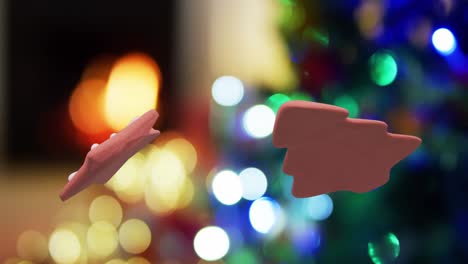 Animación-De-Galletas-Navideñas-De-Jengibre-Sobre-Luces-Navideñas-En-La-Habitación