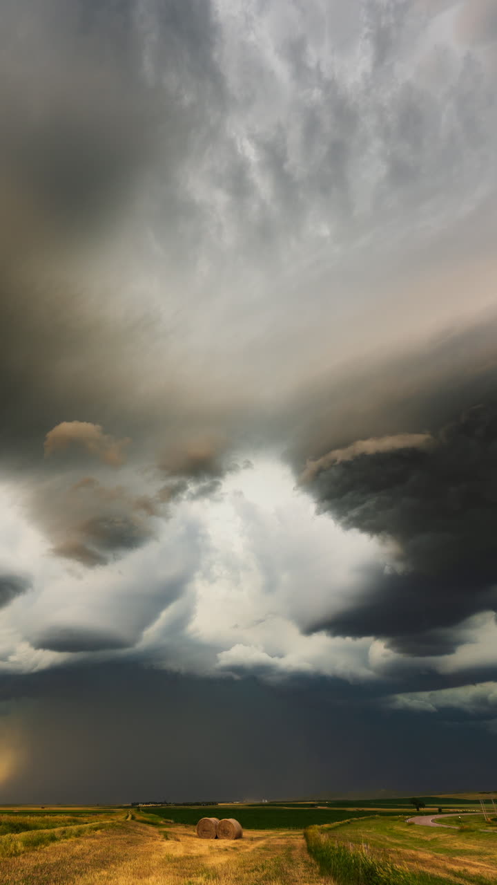Heavy thunderstorm layers moving steadily across the sky showing intense weather energy