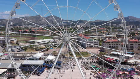 close to global view of a big wheel attraction marseille france beautiful sunny