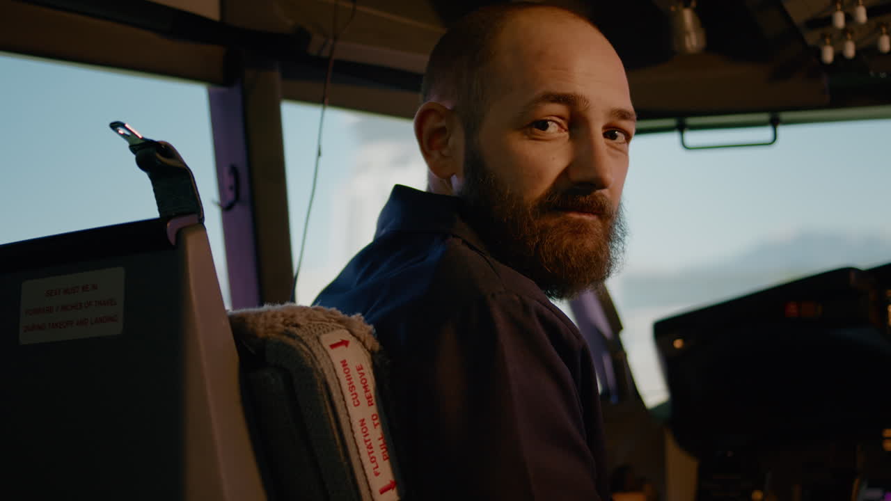 Portrait of aviation captain using control panel command to takeoff