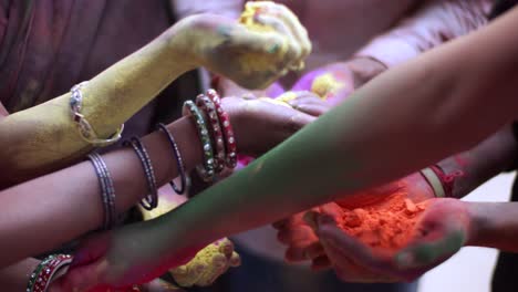 multi ethnic people celebrating the festival of colors holi in india