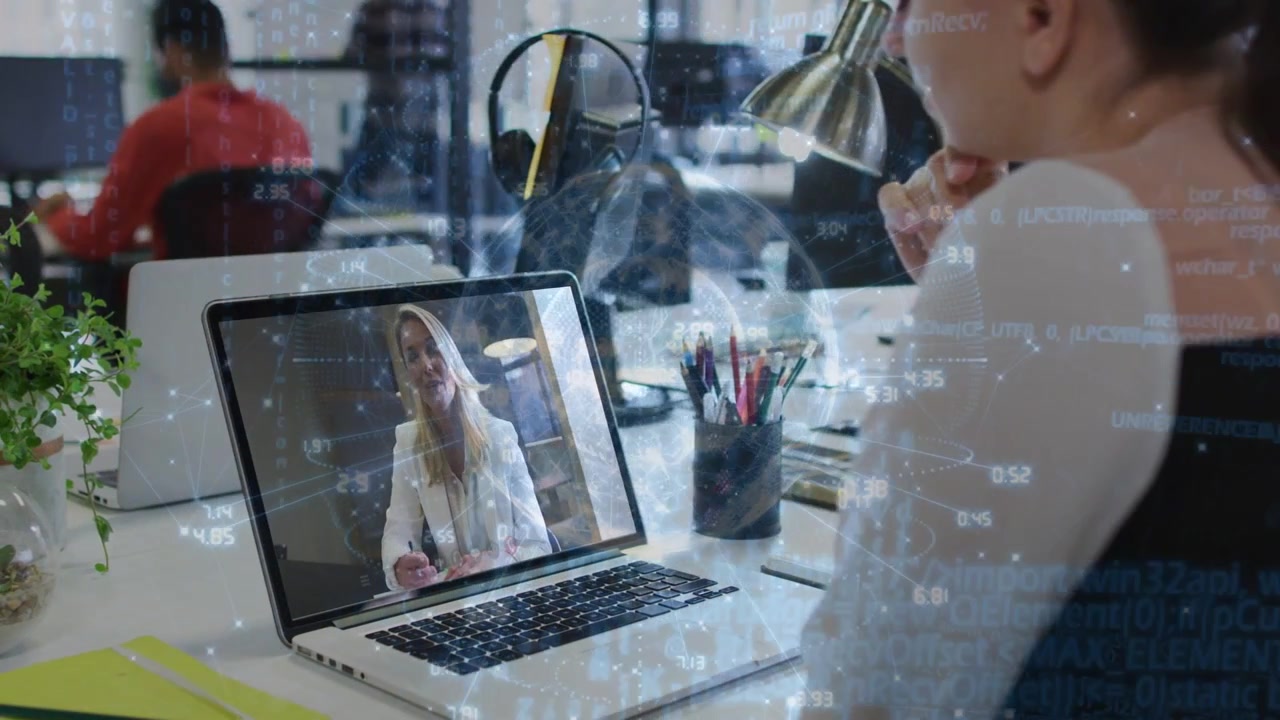 Vertical video: Woman joining call at desk leaning at laptop as IT overlay animating charts for biz