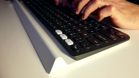 closeup view of typing hands