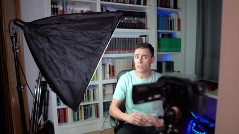 man recording video in home studio setup