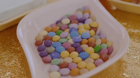 sugar coated chocolate candies in pastel colors