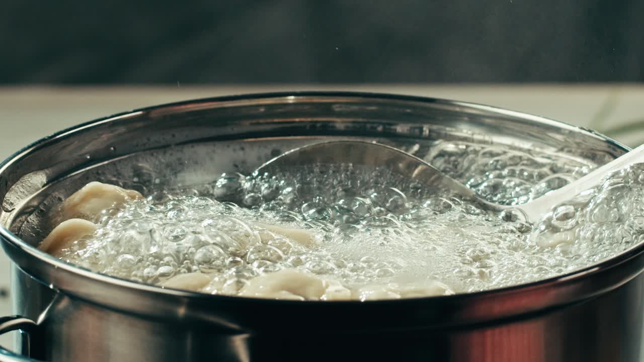 Boiling dumplings in a pot