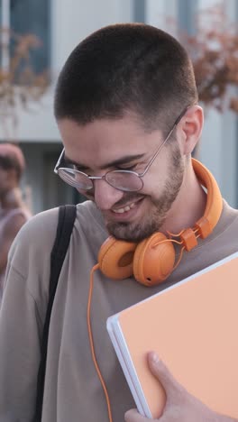 happy caucasian student smiling to the camera