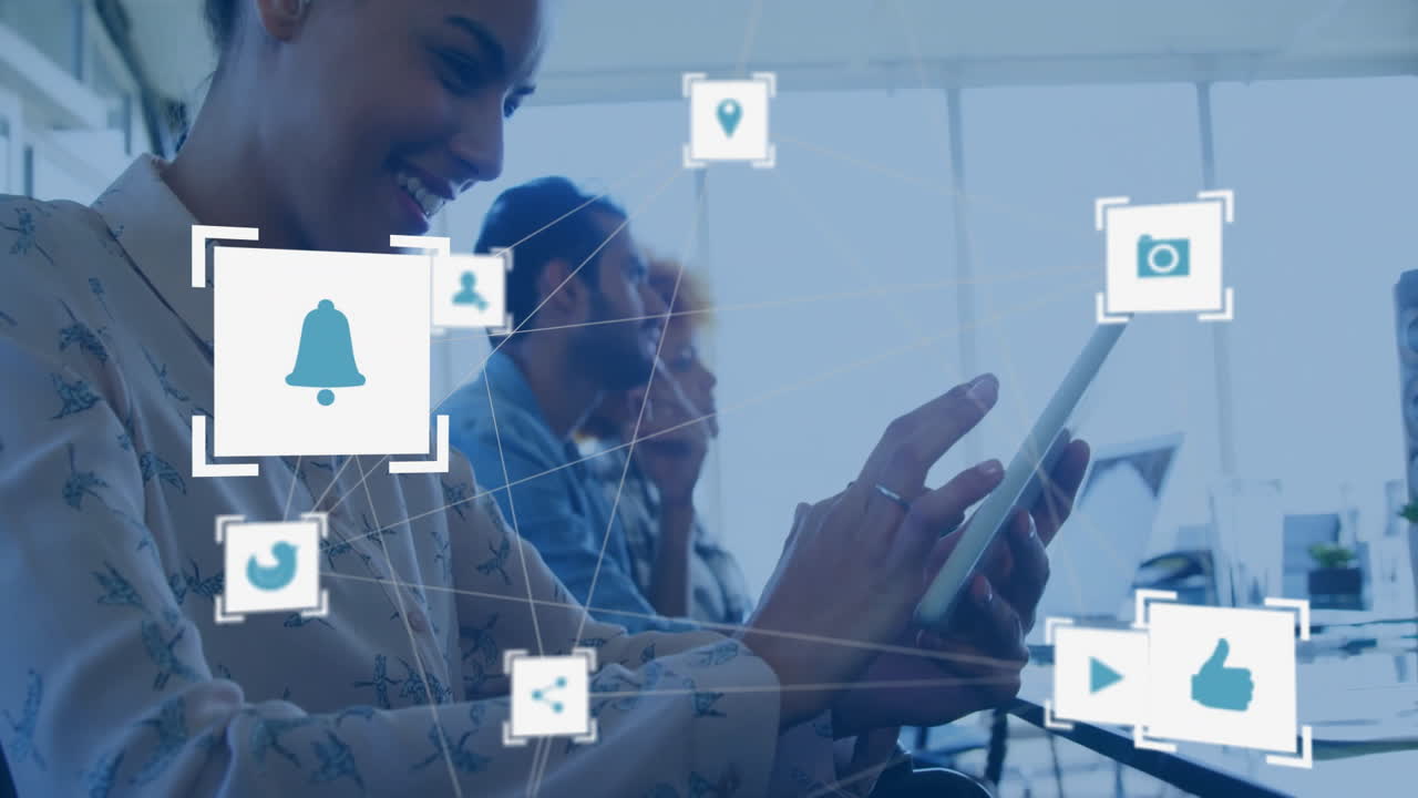 Animation of network of connections with icons over diverse business people in office