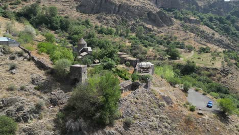 aerial arcs toward ancient armenian gndevank monastery in gndevaz