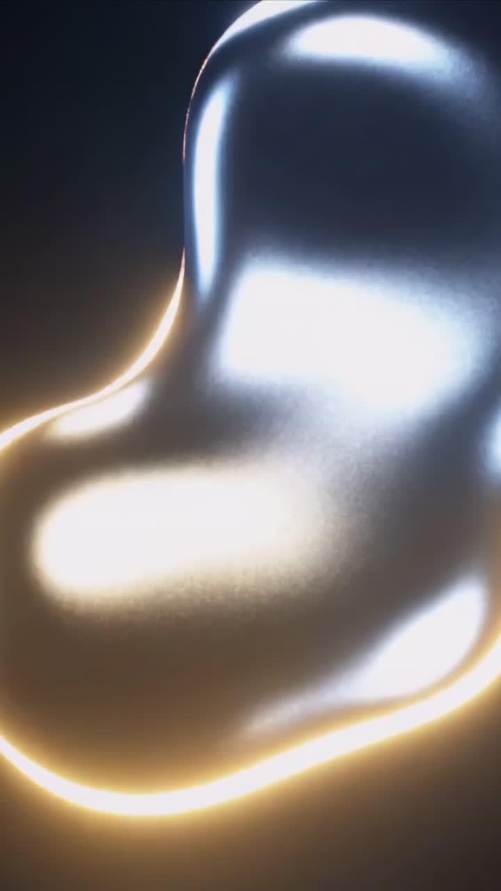 Vertical video: Shifting lights causing metal form morphing in dark set, showing silver-gold rims
