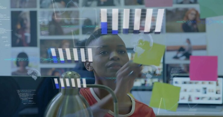 Female teen reacting to charts appearing on glass, reaching, arranging sticky notes for design