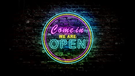 neon sign " come in we are open " banner background. neon advertising discount sale. welcome open door at storefront, restaurant, motel and business. motion 4k footage