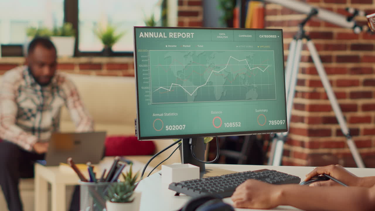 African american woman working remote on data sales report