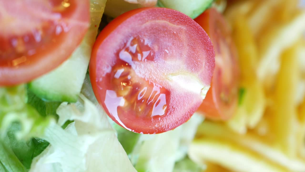 Fresh Salad with Tomato, Cucumber, and French Fries