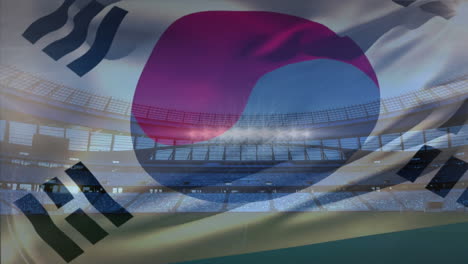 bandera ondeando frente a un estadio