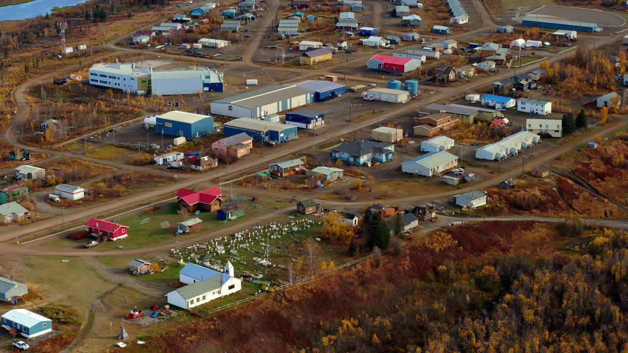 Fort McPherson Town During Autumn Season In Inuvik Region Of The Northwest Territories, Canada. Aerial Drone Shot