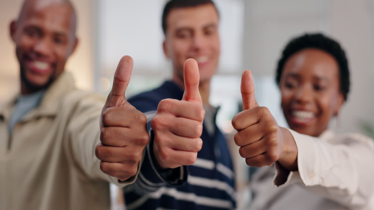 Group of people giving thumbs up
