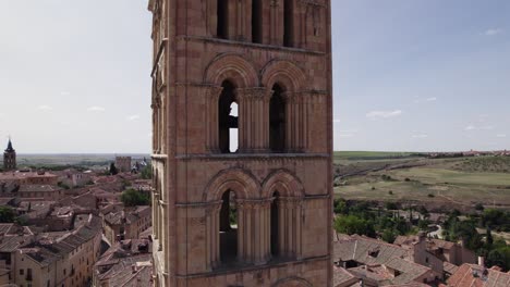Closeup-orbit-of-Romanesque-bell-tower,-Iglesia-San-Esteban,-Segovia