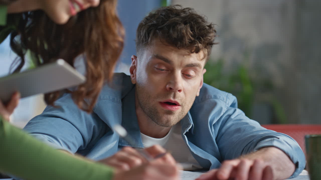 Closeup draftsman hands drawing blueprint planning construction project office