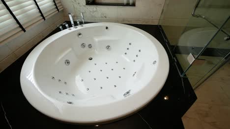 close up footage of luxury bathroom with big jacuzzi