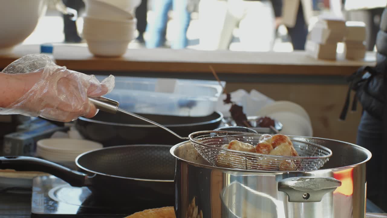 Traditional chinese spicy chicken gizzards close-up. Asian chicken stomach popular food. Local street food market outdoor. High quality 4k footage
