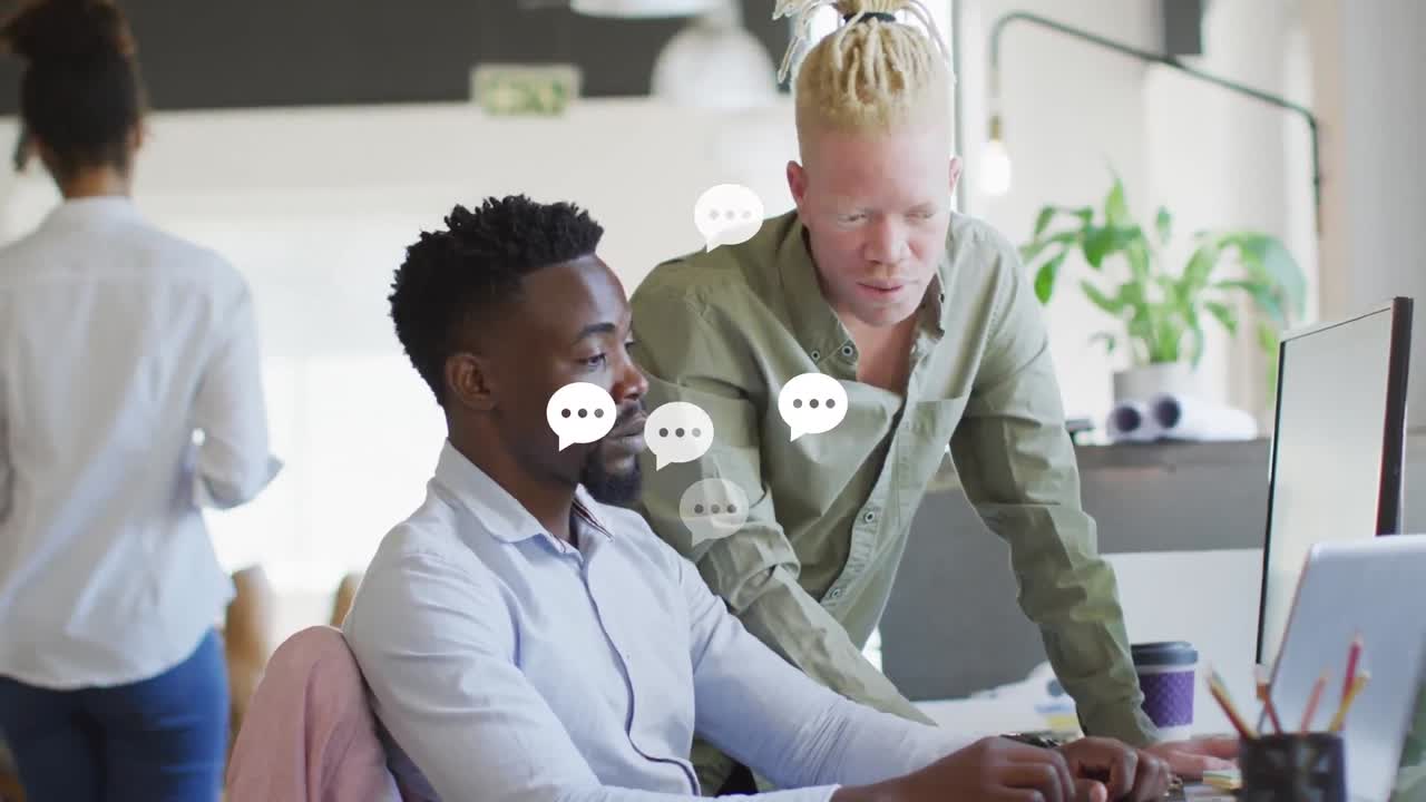 Animation of emoji falling over business people wearing phone headsets