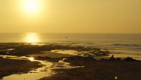 golden sunset over the coastal rocks