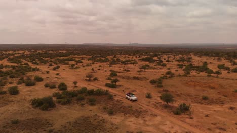 a 4x4 offroad car driving through samburu land in northern kenya