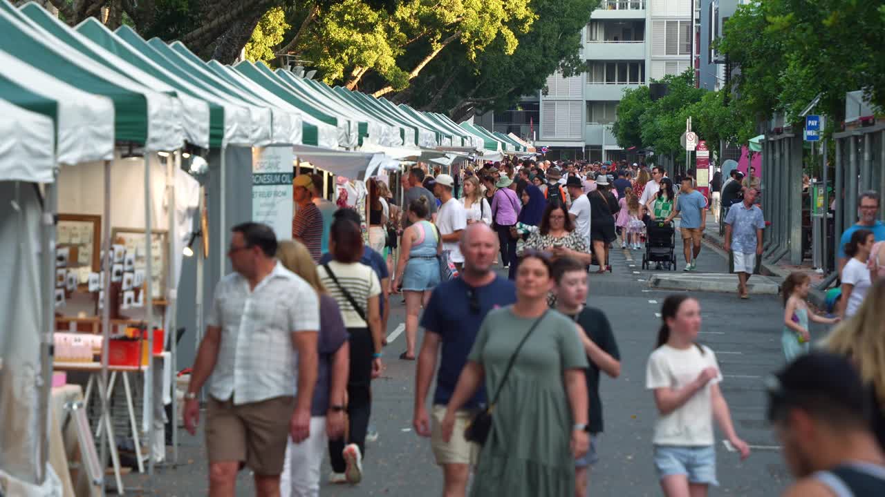 People visiting the Collective Markets in South Brisbane on the weekend, Brisbane's premier recreational and cultural destination with market stalls run along Little Stanley street.