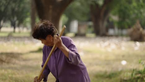 Elderly Woman Working Outdoors