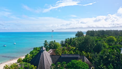 aerial drone view of denis private island in the seychelles, indian ocean