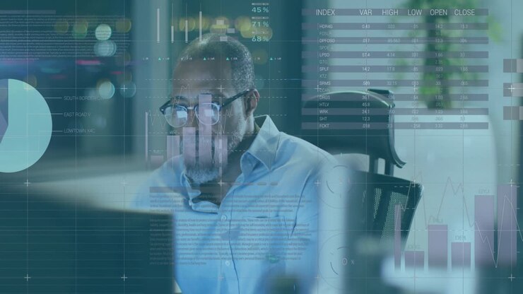 Mature adult man watching financial charts appearing over screen, studying data and typing analysis
