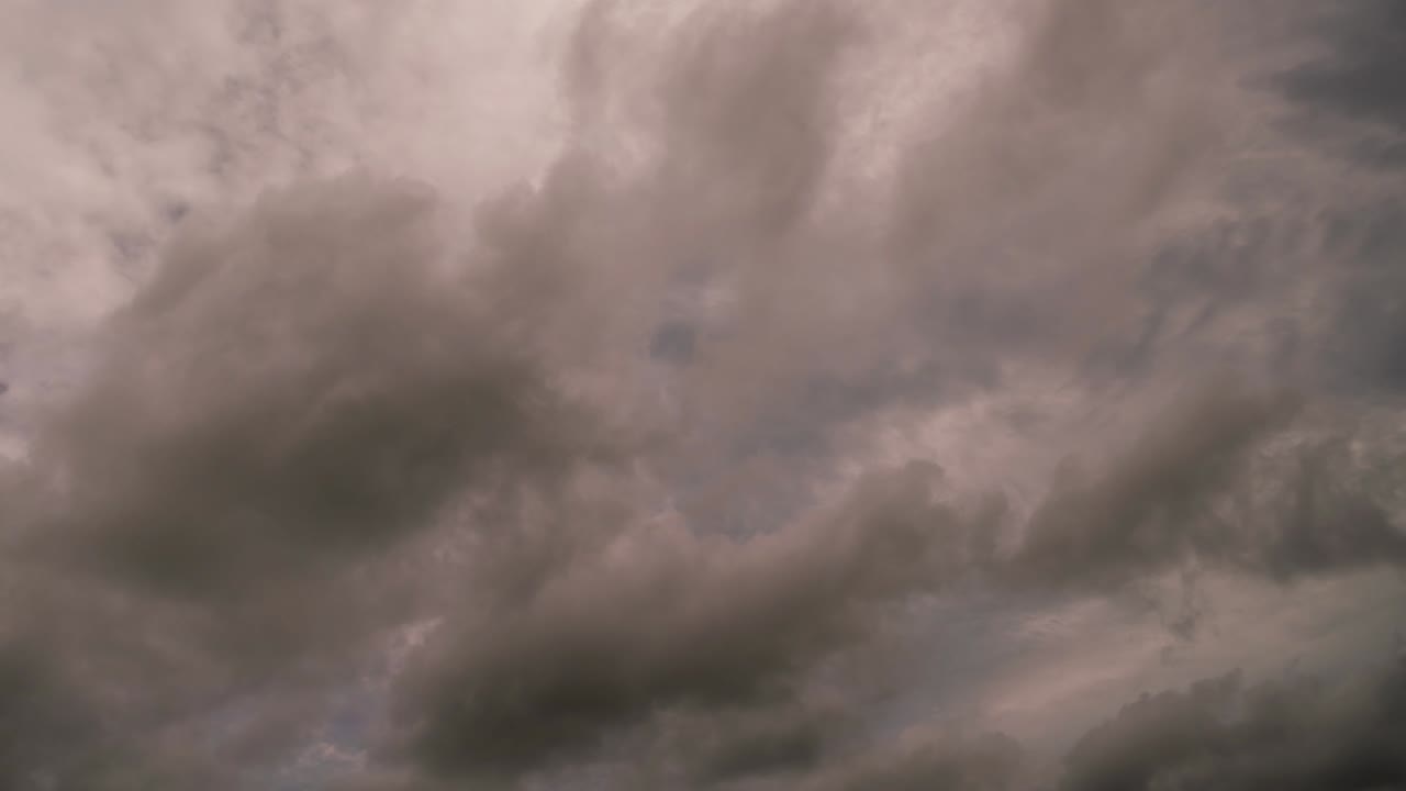 Footage B Roll Timelapse sky and black clouds in rainy weather Thunderous clouds Summer rain Rainy global warming effect black thunderstorm dramatic 4K Timelapse